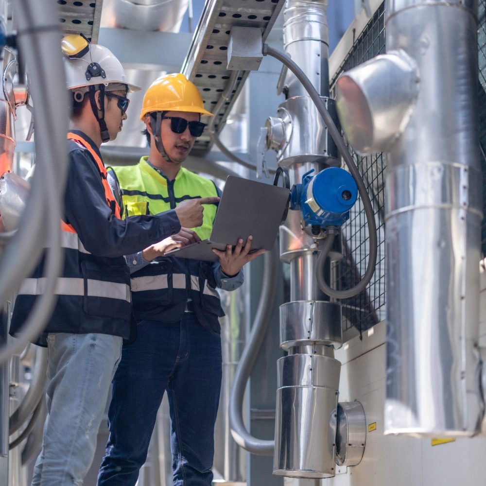 engineers-inspecting-industrial-equipment-with-lap-2026-01-07-00-20-45-utc (1)